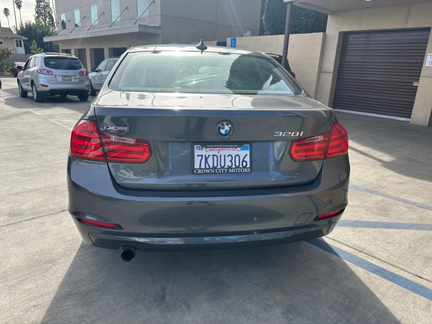 2014 Gray /Black BMW 3-Series 320i xDrive (WBA3C3C57EP) with an 2.0L L4 DOHC 16V engine, Automatic transmission, located at 30 S. Berkeley Avenue, Pasadena, CA, 91107, (626) 248-7567, 34.145447, -118.109398 - Navigation! Back-up camera! 2014 BMW 3-Series 320i xDrive - The Ideal Choice in Pasadena, CA Looking for top-tier BHPH cars in Pasadena, CA? Look no further than the 2014 BMW 3-Series 320i xDrive. As a reputable BHPH dealer in Los Angeles, CA, we take pride in offering some of the finest pre-own - Photo#3